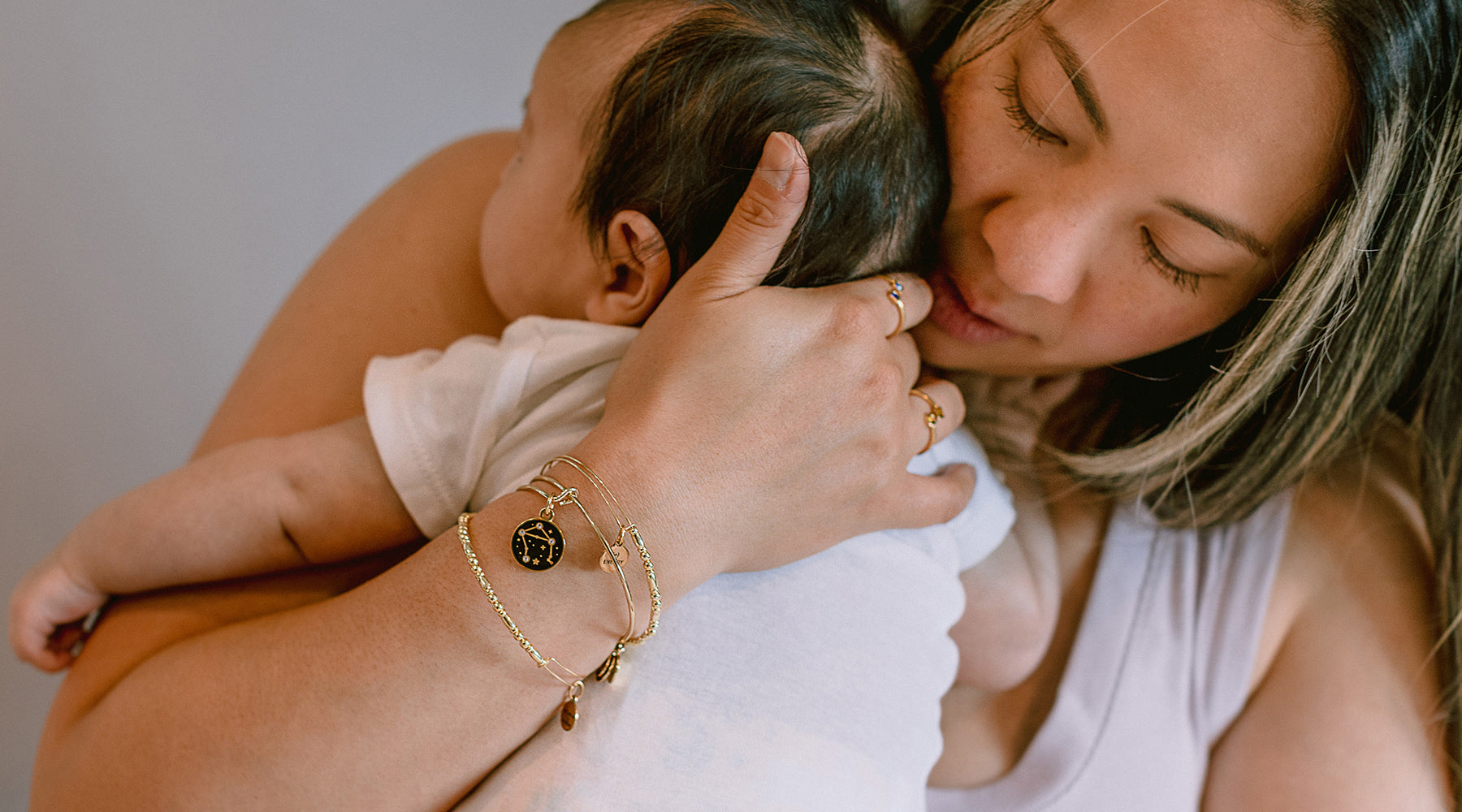 mother holding newborn baby