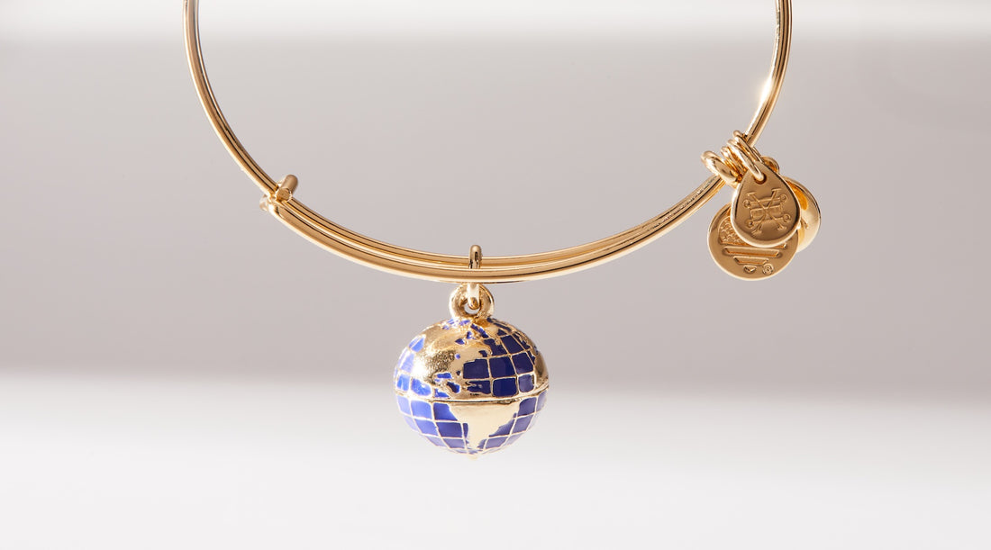 globe charm on a bangle