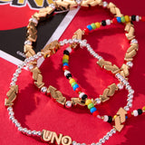 UNO™ Reverse Symbol Stationed Stretch Bracelet