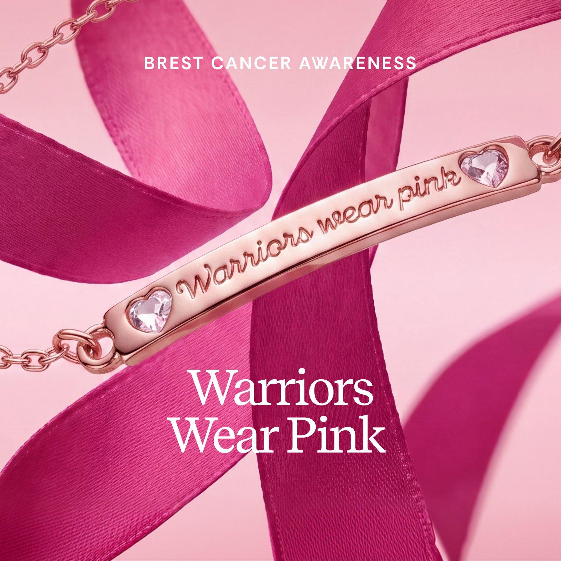 A rose gold bar necklace with heart-shaped clear gemstones and the engraved words 'Warriors wear pink,' draped over bright pink ribbons. Text at the top reads 'BREST CANCER AWARENESS' and large text at the bottom reads 'Warriors Wear Pink.