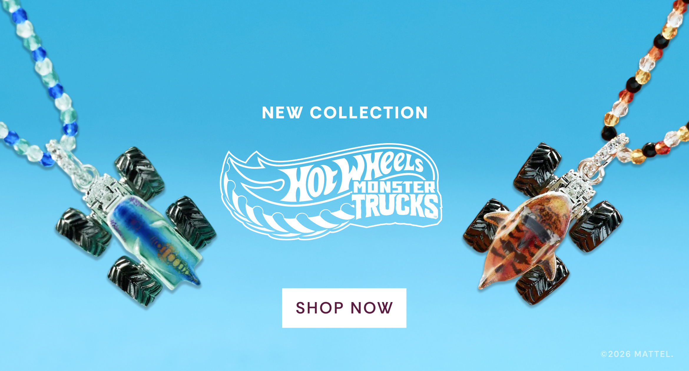 Hot Wheels Monster Trucks jewelry collection with necklaces on a blue background