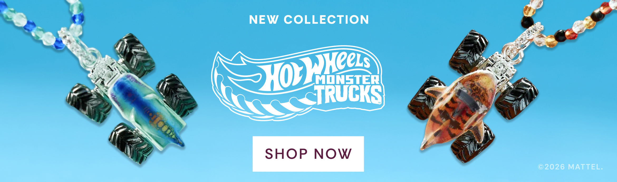 Hot Wheels Monster Trucks jewelry collection with necklaces on a blue background
