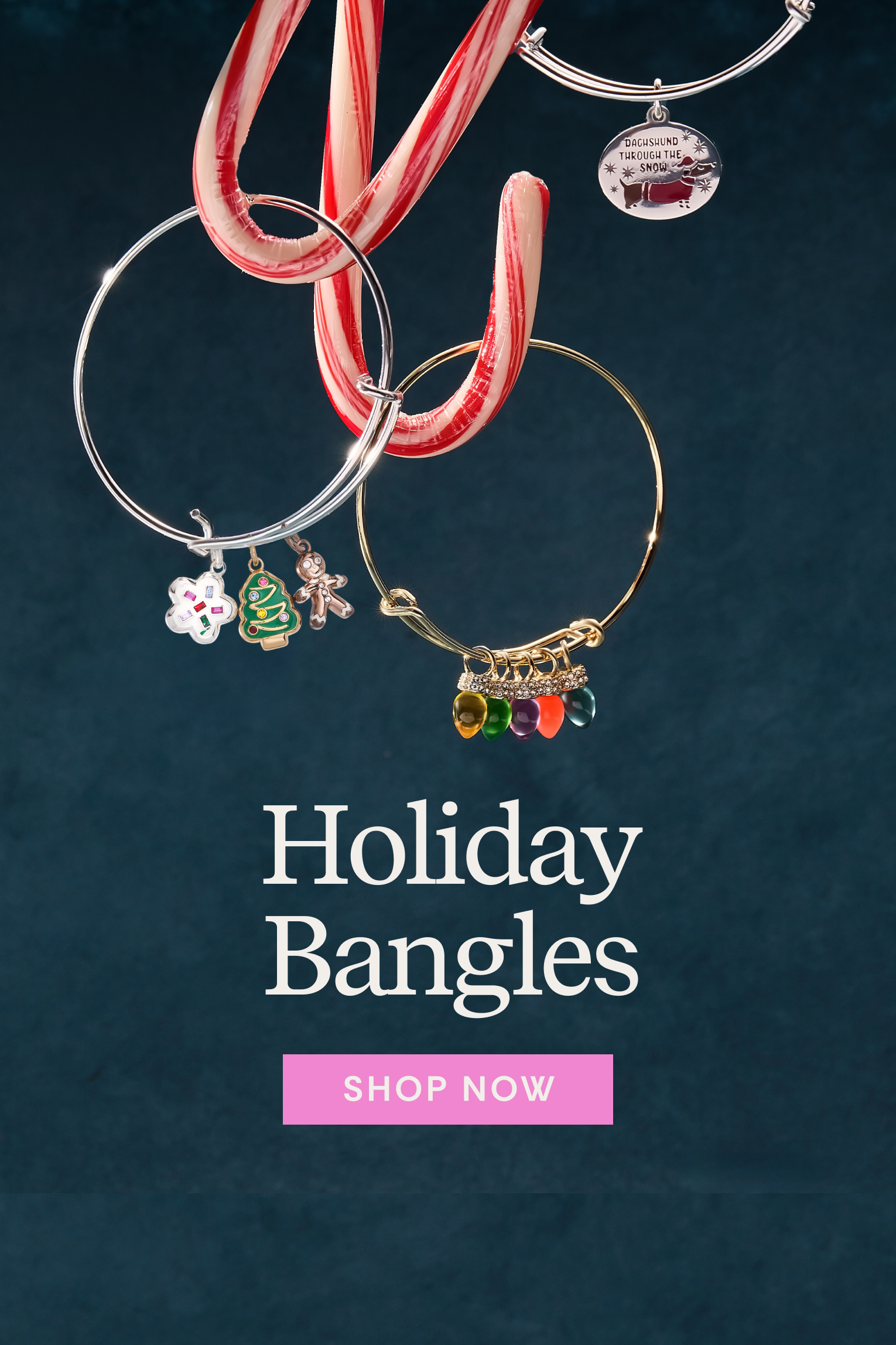 Holiday-themed bangles with charms on a dark background, featuring a 'Shop Now' button.