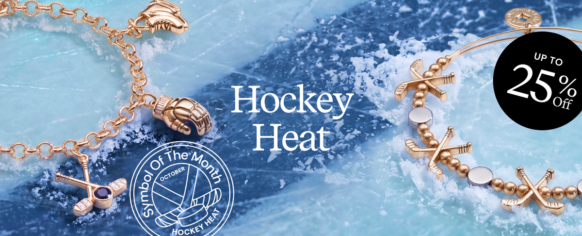 A promotional banner for hockey jewelry featuring a gold-tone hockey-themed charm bracelet on the left and a beaded bracelet with hockey sticks on the right, set against a background of ice and water with the text 'Hockey Heat' and a 'Up to 25% Off' badge.