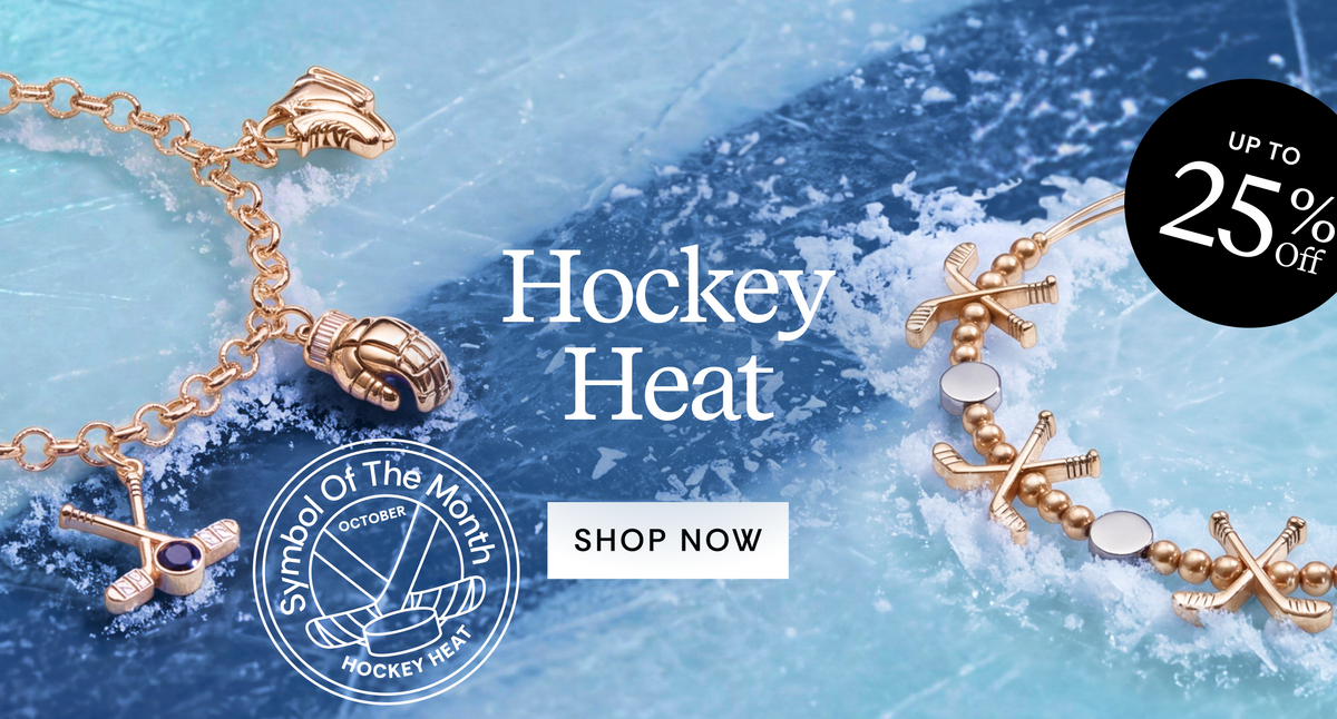 A promotional banner for the 'Hockey Heat' jewelry collection, showing two gold-toned bracelets on a textured ice background. One bracelet features a hockey player charm, while the other features hockey sticks and pucks.