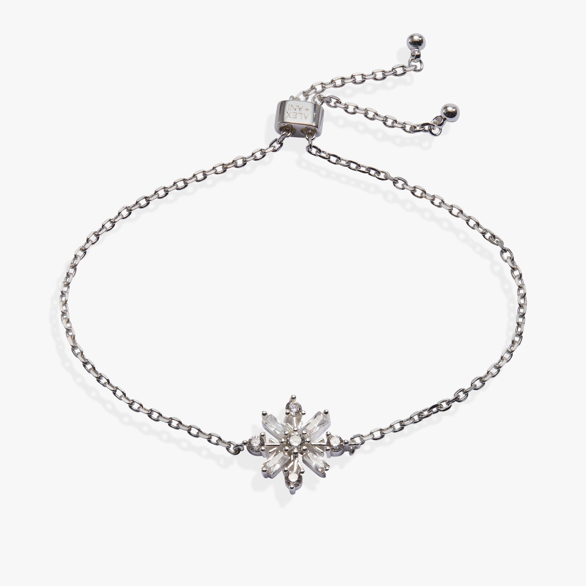 A silver-toned chain bracelet featuring a central snowflake charm set with clear crystals, displayed on a clean white background.