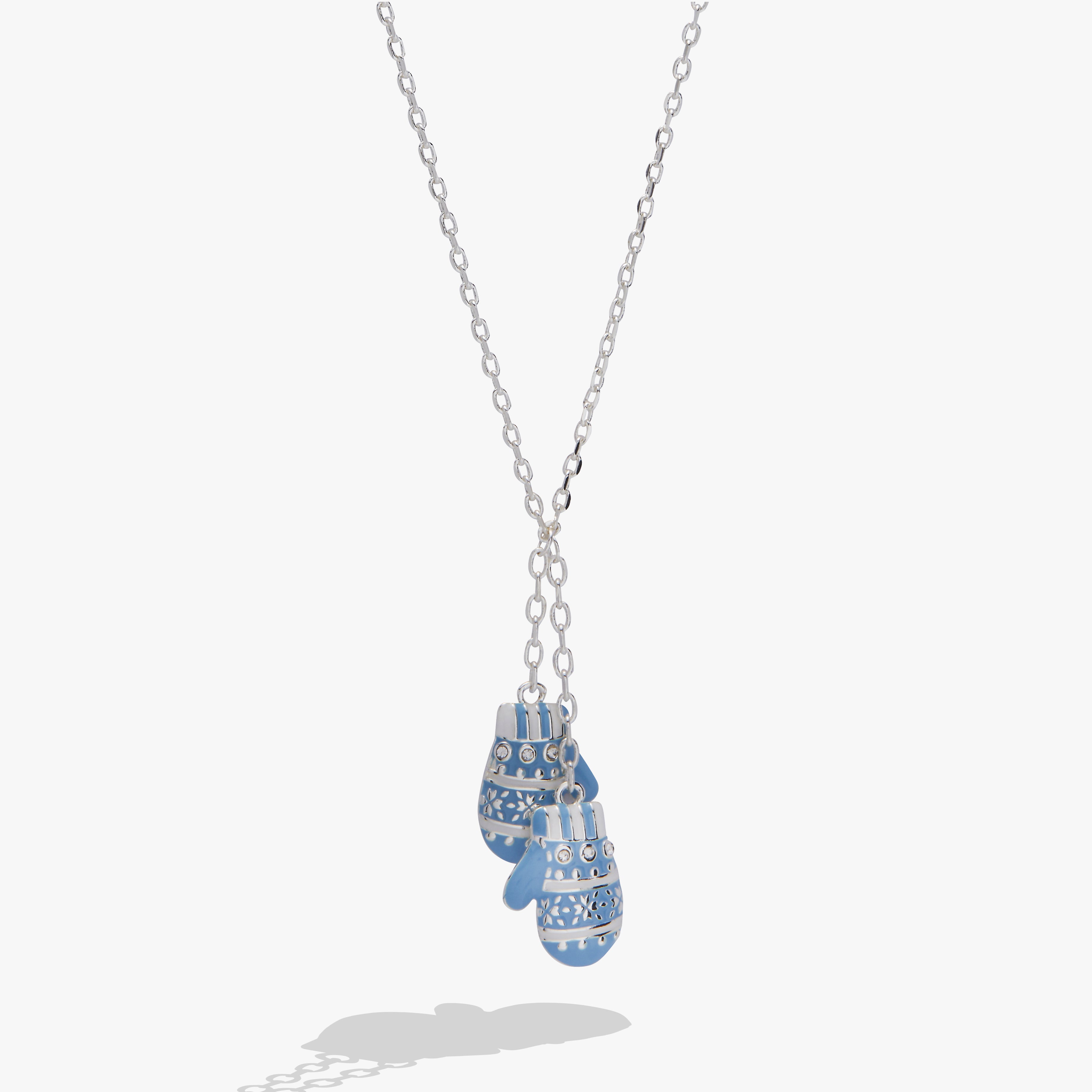 A silver chain necklace featuring a double pendant design shaped like a pair of blue and white patterned knit mittens, shown against a light gray background.